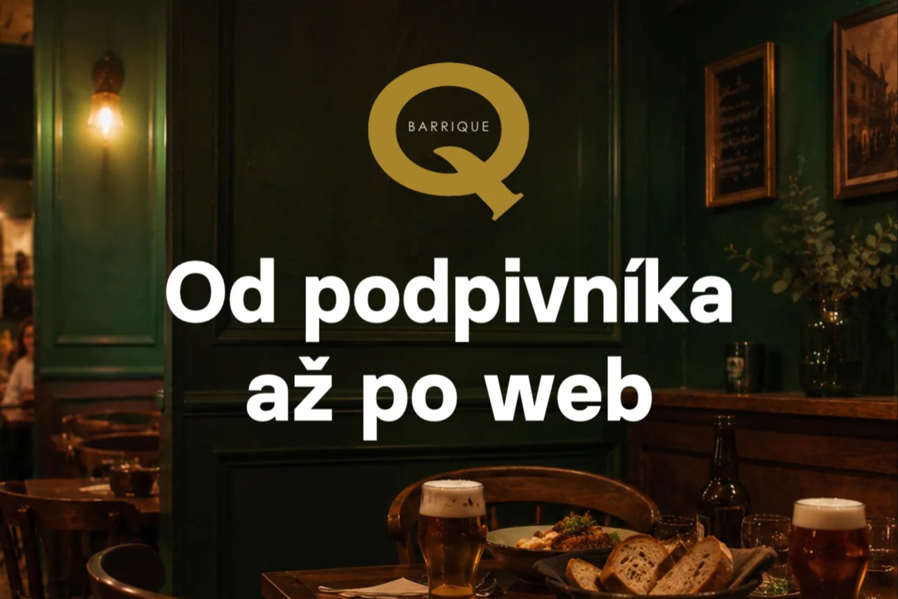 Interiér restaurace BARRIQUE Žilina s logem, pivem a chlebem na stole